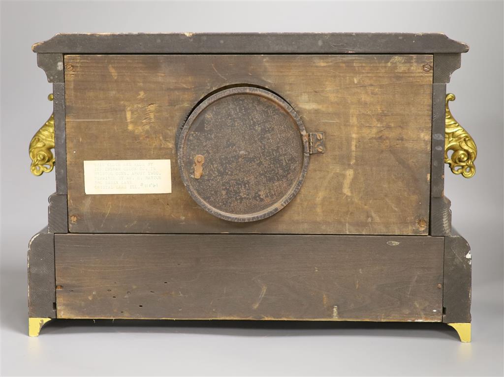 An American ebonised mantel clock, length 46cm